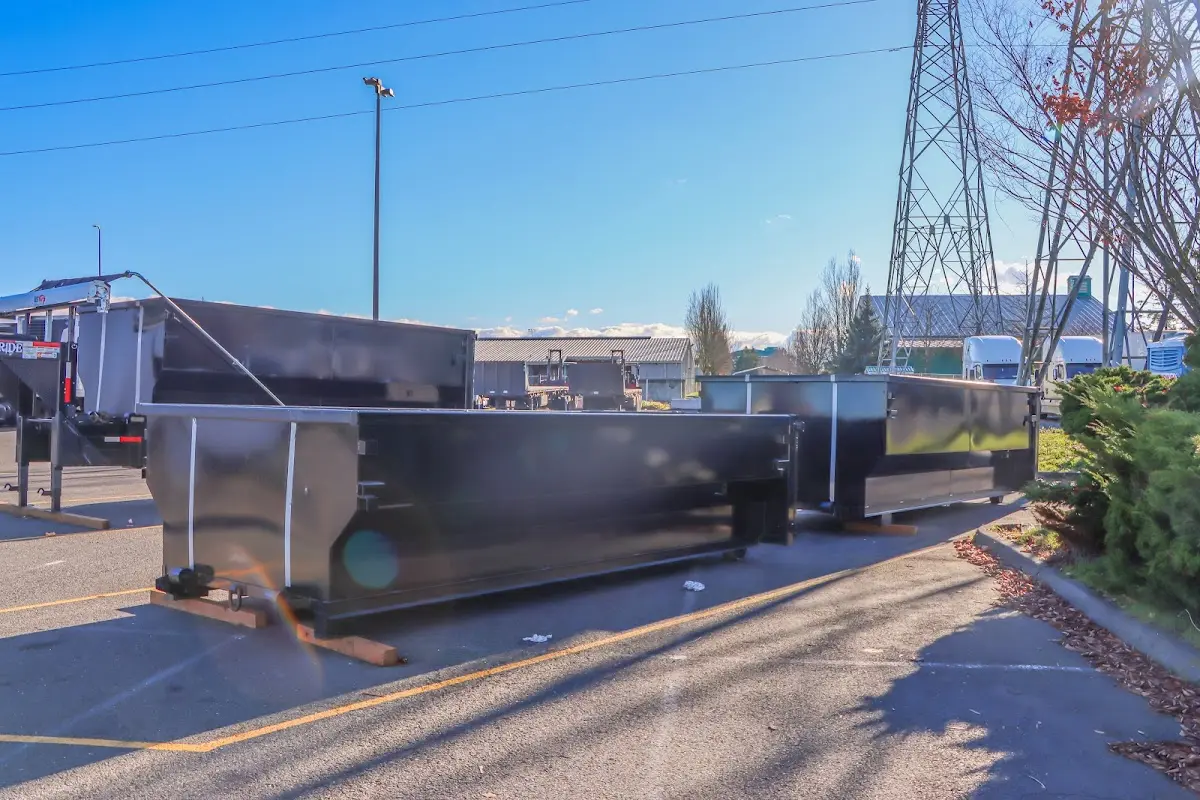 Roll-off dumpster ready for waste disposal at job site for Yard Waste Dumpster Rental in Carlisle